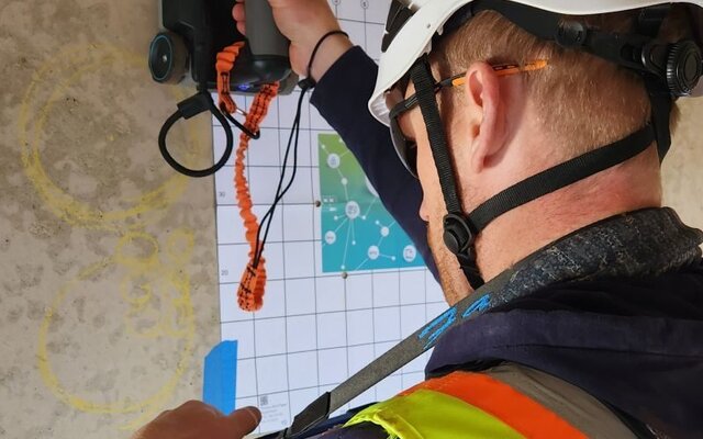 Engineer scanning a structure on site